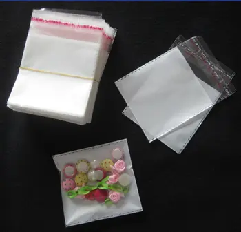 

Wholesale (100pcs/lot) Pearl film Transparent Pasted OPP Packing Bags for Pendant / Rings / Earrings / Bracelets Jewelry 9x7 cm