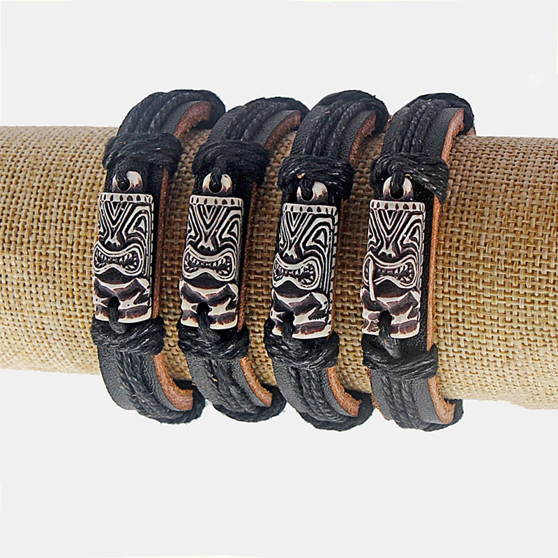 

Wholesale 12pcs Black Leather White Tiki Man Charm Bracelets