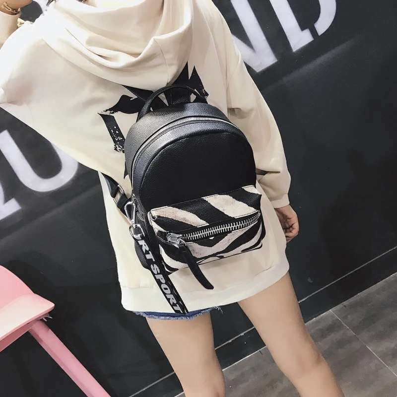 

Zebra pattern shoulder bag female 2018 new Korean fashion wild personality big zipper hit color small backpack tide