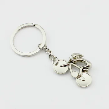 

FREE shipping by FEDEX 100pcs/lot 2015 New Hot Novelty Zinc Alloy Man Riding Bicycle Keychains Metal Bike Keyrings for Gifts