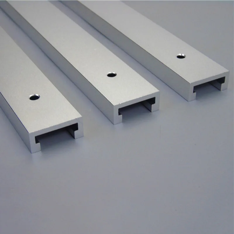 направляющие алюминиевые профили. профиль алюминиевый конструкционный 20х20. профиль направляющая для подвесной системы ms 184 airsoft, l=5800, a00. профиль-шина t-track алюминиевая для параллельного упора 100х53. профиль алюминиевый 90х40.