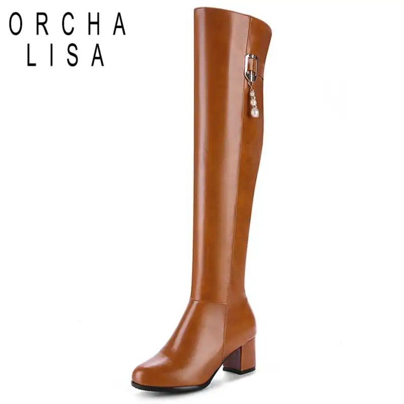 knee high string up boots