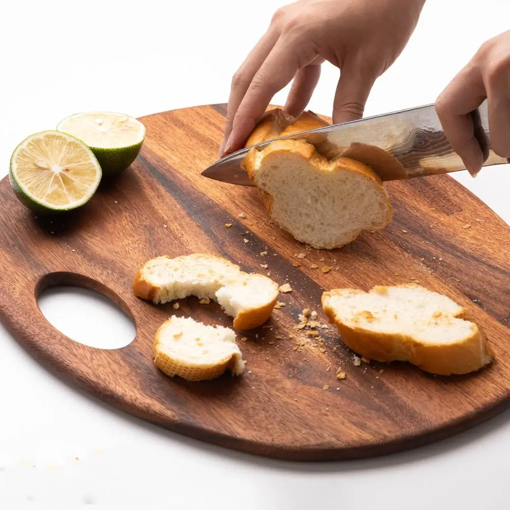 

Oval fruit chopping board Acacia wood kitchen board cutting board fruit and vegetable chopping board raw cooked meat