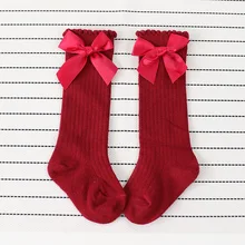

Spring and autumn new girls solid color bubble mouth tube socks baby bow lace vertical socks