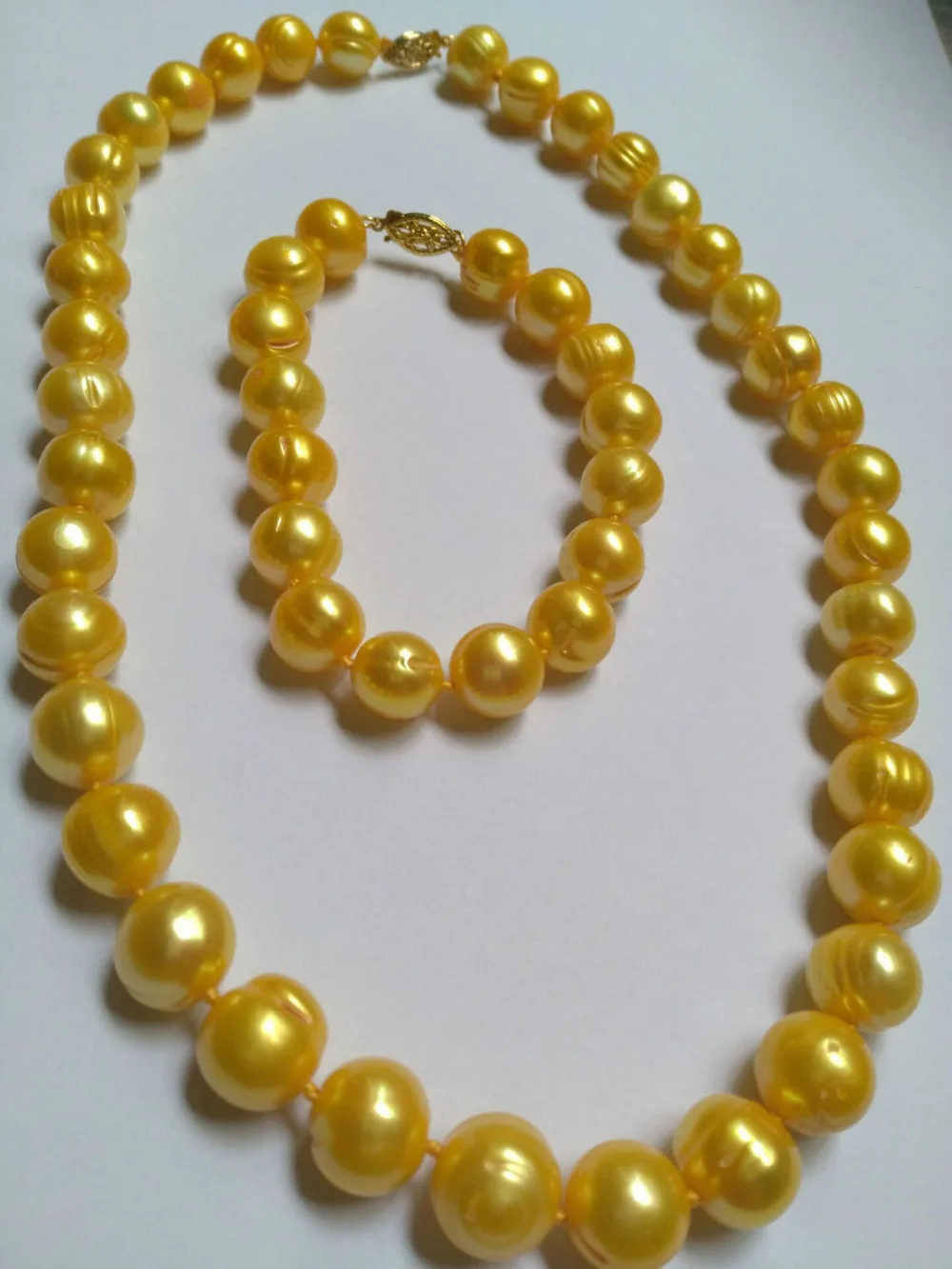 

SHIPPING HOT sell new Style >>>> HUGE AAA 11-12mm Natural south sea golden pearl necklace 18"+bracelet 7.5-8