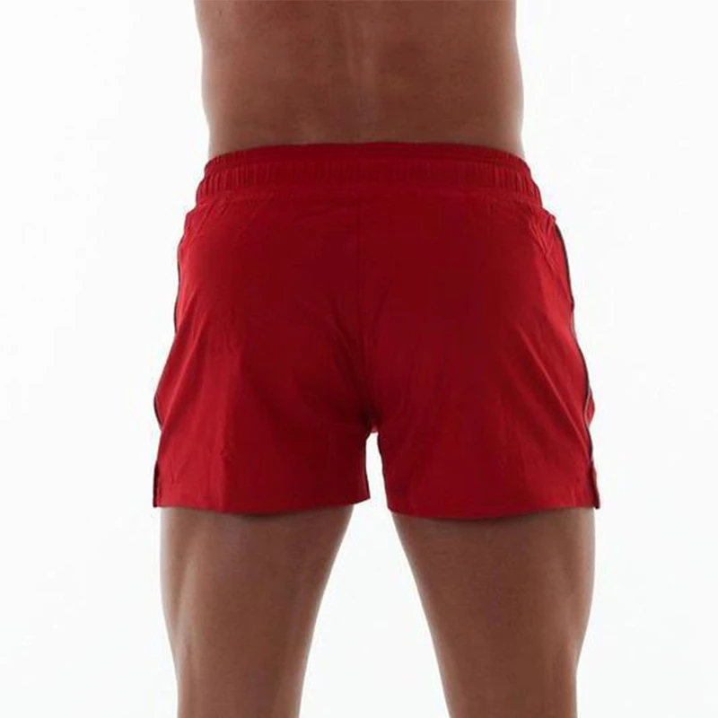 Летние однотонные сетчатые компрессионные быстросохнущие шорты, мужские спортивные штаны для тренажерного зала, мужские шорты для фитнеса, облегающая одежда