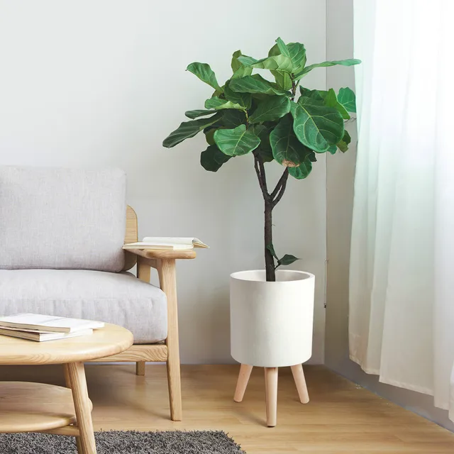 Simple round magma flower pot black white wooden leg elevated flower