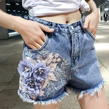 MUMUZI Лидер продаж рваные цветок горячие брюки для женщин шорты для летние повседневное джинсовые винтажные шорты бахромой