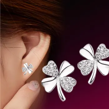 

Anenjery Hot Sale Silver Color Earrings brincos pendientes Lucky Clover Stud Earrings For Women Gift oorbellen S-E55