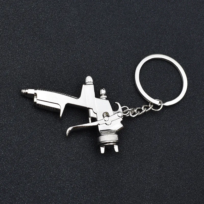 Water Spray Gun Keychain Metal Men Gift Car Key Chain Motorcycle Auto Accessories Creative Key Ring Water gun Key Cover Holder