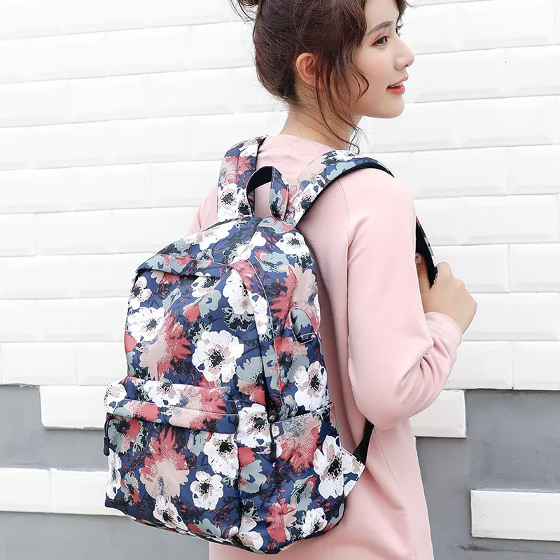 

Multi-function backpack USB charging Color pattern distribution backpack Female student notebook bag Computer shoulder bag Outdo
