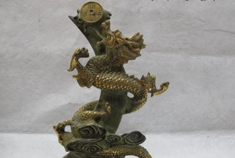 

China Folk Classic Bronze Gilt Lucky Fly Spiral Dragon Play Coin Money statuary