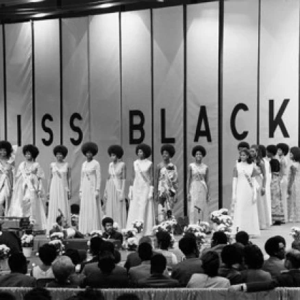 Group of young women standing on stage for a beauty pageant Poster Print (18 x 24)