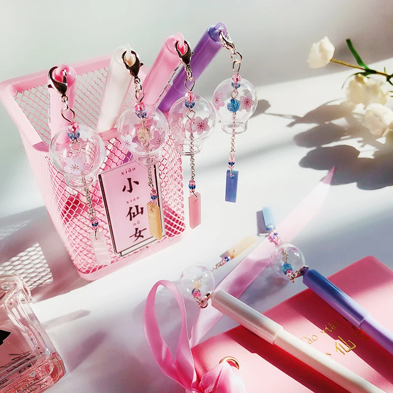 

1Pcs Novelty Gel Pen 0.5mm Kawaii Wind Chimes Pendant Neutral Pens for School Writing Office Supplies Stationery Girls Gift