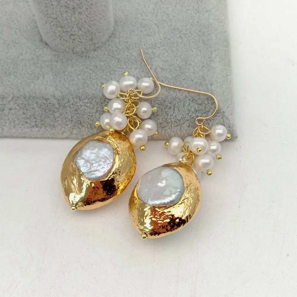 

White Pearl Golden plated Hook Earrings