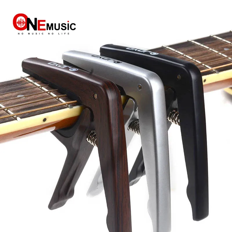 

Colorful Joyo High Quality Plastic Guitar Capo for 6 String Gutiar Wood or Electric Black Silver Wood color