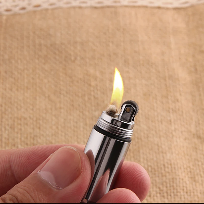 

Mini Compact Kerosene Lighter Capsule Gasoline Lighter Inflated Key Chain Petrol Lighter Grinding Wheel Lighter