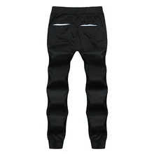 Сезон: весна–лето мужчины сплайсинга троса эластичная резинка на талии шаровары Повседневные пот Штаны Мужские Беговые брюки в повседневном стиле луч ноги Штаны