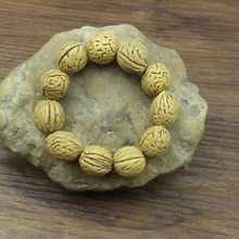 Natural mountains wild peach beads bracelets Wenwan Zhaocai walnut peach Bodhi bracelet Jewelry designer goods