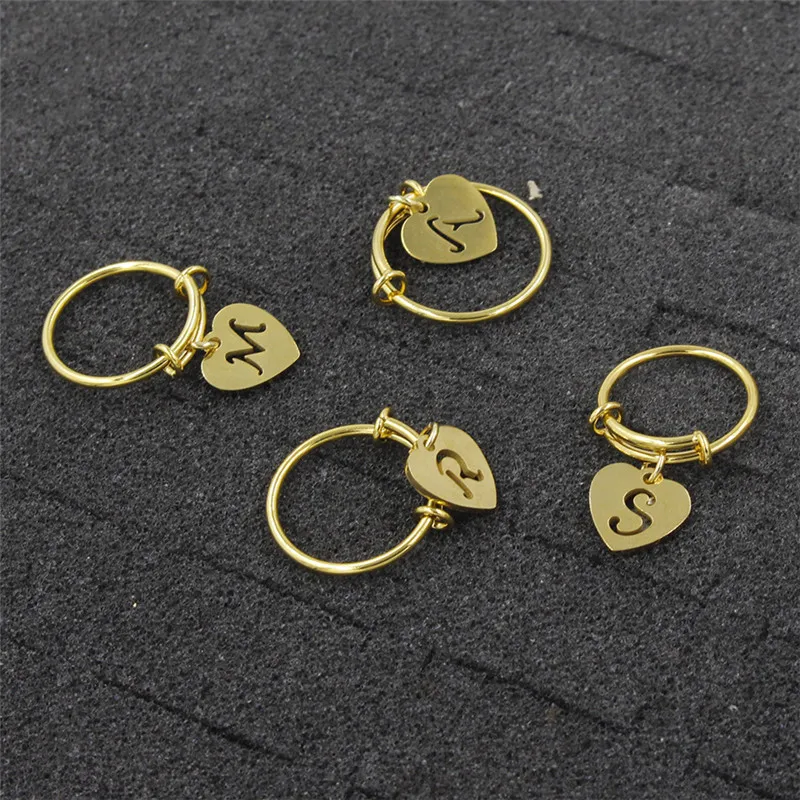 

1.6 mm 26 letter gold fashion couple stainless steel titanium steel letters love pendant ring family friendship pendant coil rin