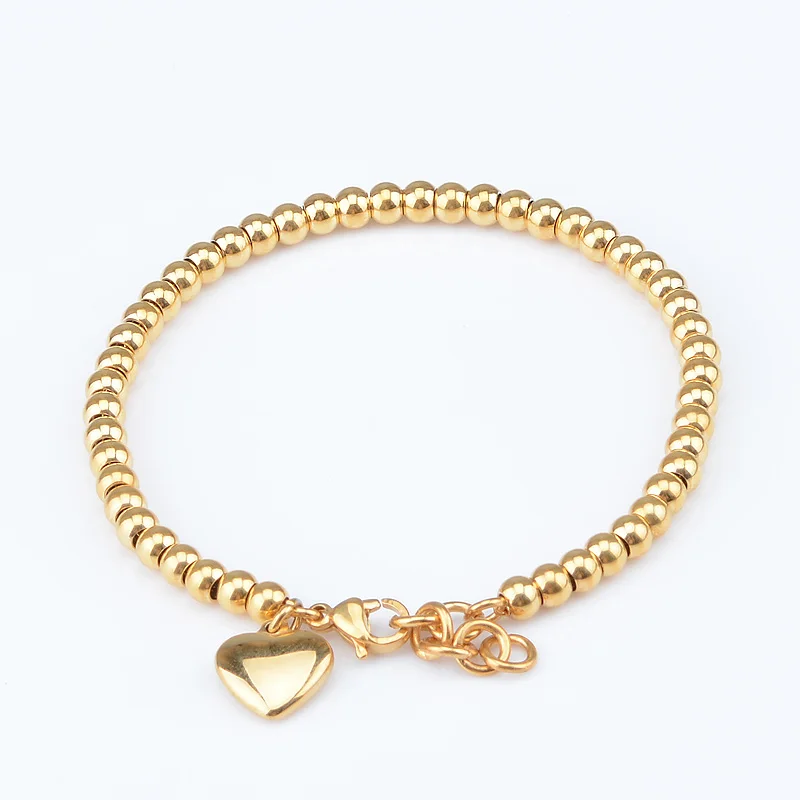 Silver Bangle with Gold Color Beads