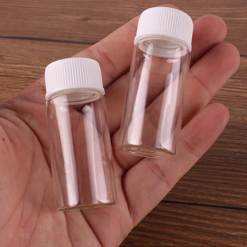 

100pcs 22*50mm 10ml Transparent Glass perfume Spice Bottles with White Plastic Screw lid Tiny Jar Vials DIY Craft