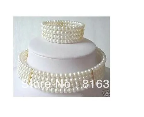 

FREE SHIPPINGStuning New 6mm White Pearl Necklace Bracelet set (A0423)