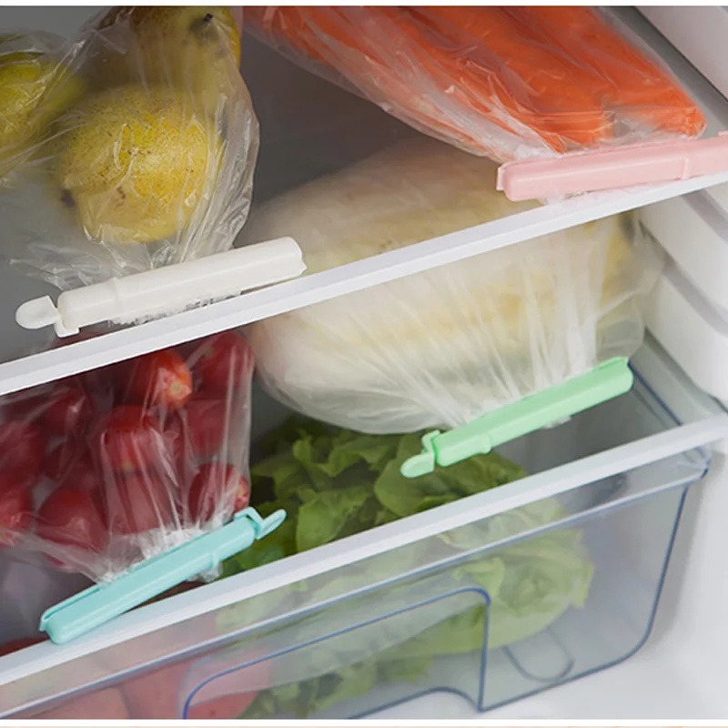 4-pcs-Set-New-Style-Suction-Cup-Snacks-Food-Bag-Sealing-Preservation-Clips-can-be-stored (4)