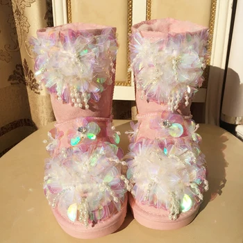 Winter exclusive custom cute pink three-dimensional flower sequins pearl snow boots wild warm thick non-slip leather snow boots.
Winter exclusive custom cute pink three-dimensional flower sequins pearl snow boots wild warm thick non-slip leather snow boots.
