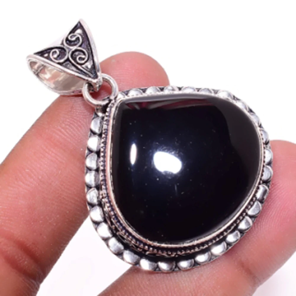 

Black Onyx Pendant Silver Overlay over Copper , 47mm, P6531