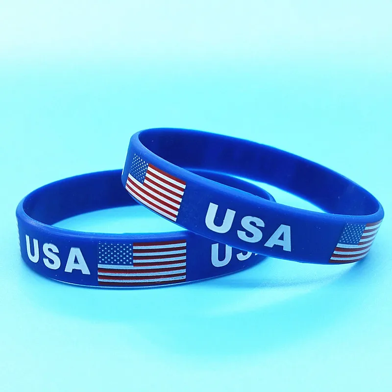 100 шт., спортивный браслет с флагом США, американский логотип, резиновый ремешок на запястье с гравировкой, силиконовый браслет, мужские браслеты, аксессуары