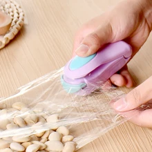 Aferidor mão-pressionado pequeno saco de alimentos para uso doméstico super aferidor portátil mini engrapadora de calor