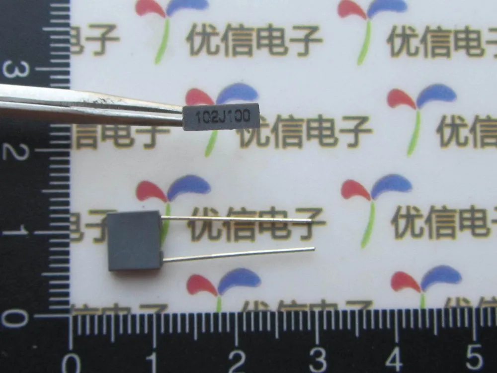 100V 102J 1NF