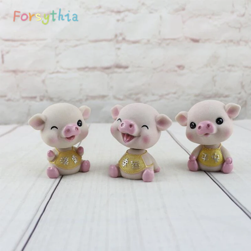 

2019 pig year creative cute shaking head pig treasure car decoration resin crafts