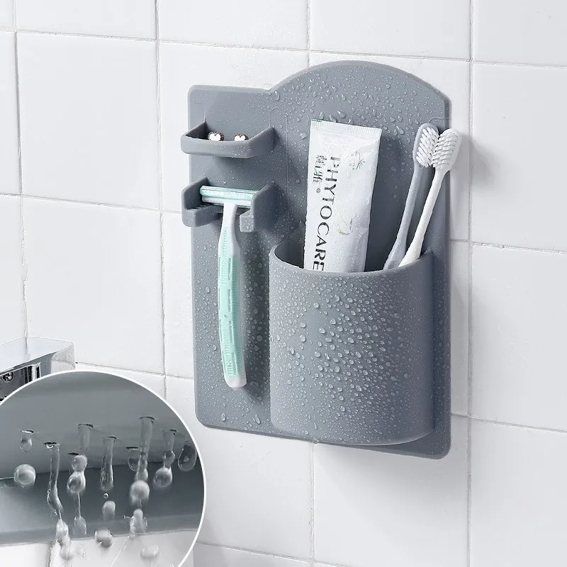 

Silicone manual razor holder free punching bathroom toothpaste storage rack Adsorption razor rack travel toothbrush organizer