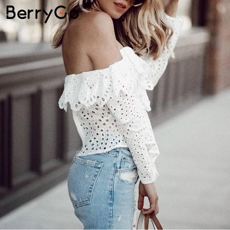

BerryGo Sexy ruffled white blouse women Asymmetrical one shoulder female blouses Streetwear cotton lace embroidery korean tops