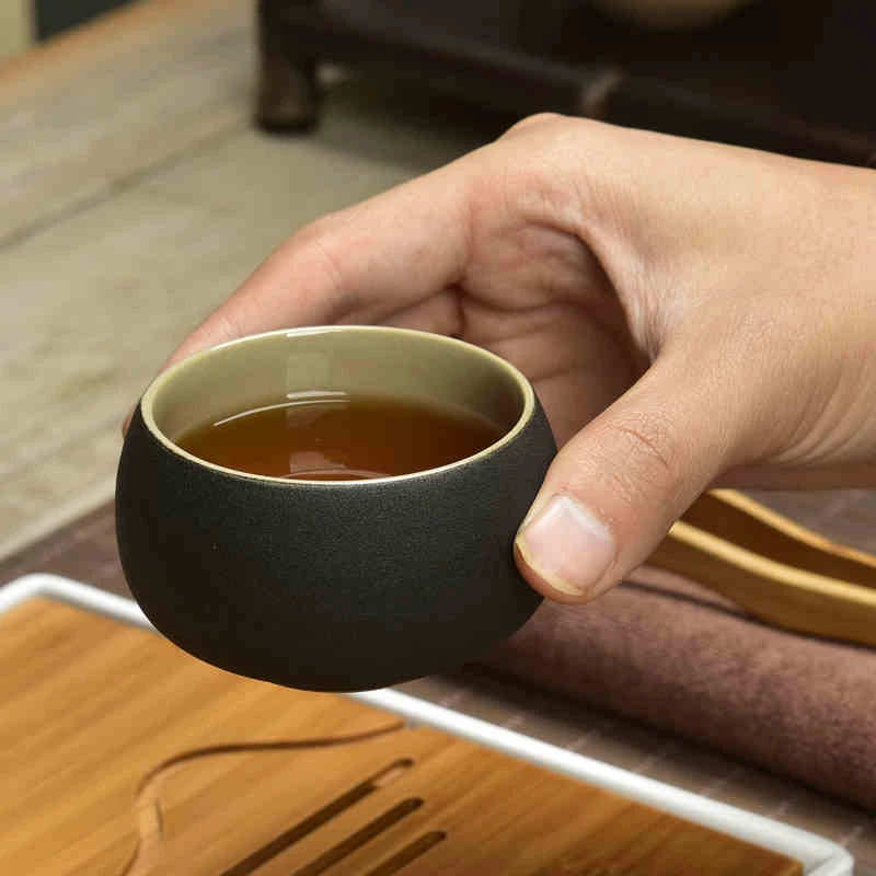 

Free shipping ceramic kung fu tea cups, retro black and white thick ceramic tea sets, scrub Kung Fu teacup
