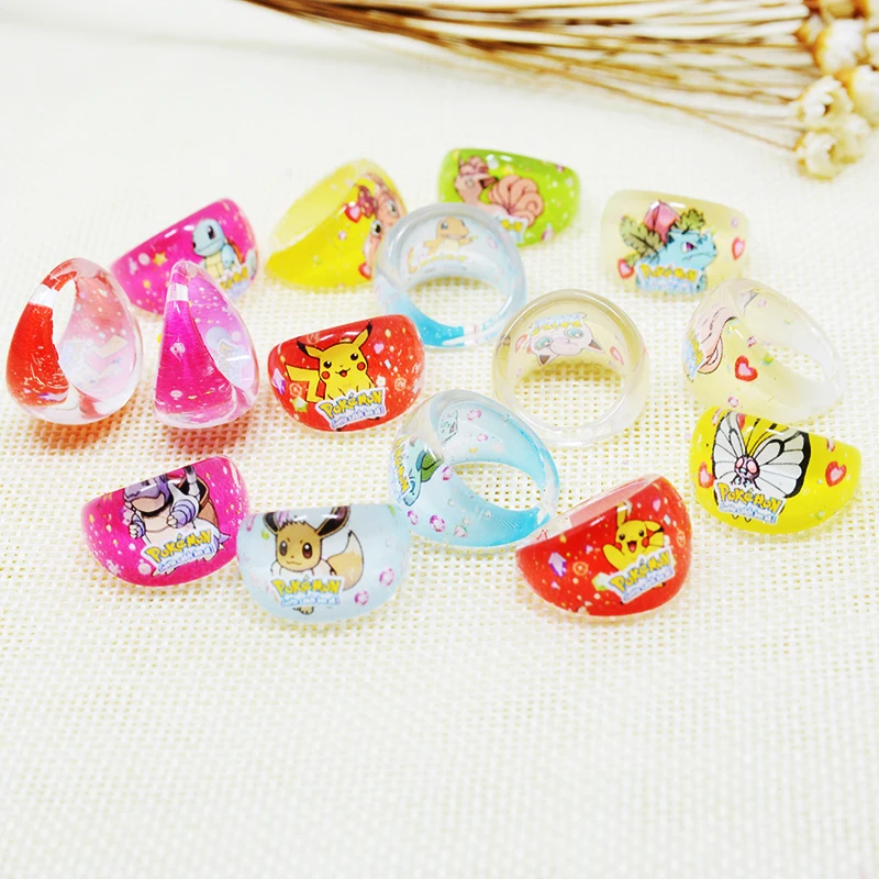 

Fanrar Wholesale Accessories 20pcs mixes Cartoon Pokemon Game Acrylic kids Rings Girl anillo Souvenir Gift Party Supply