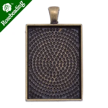 

27x46mm Antique Bronze Plated Pendant trays,inner 25x35mm,fit 25x35mm rectangle glass cabochon,depth 4mm,sold 20pcs/lot-C3499