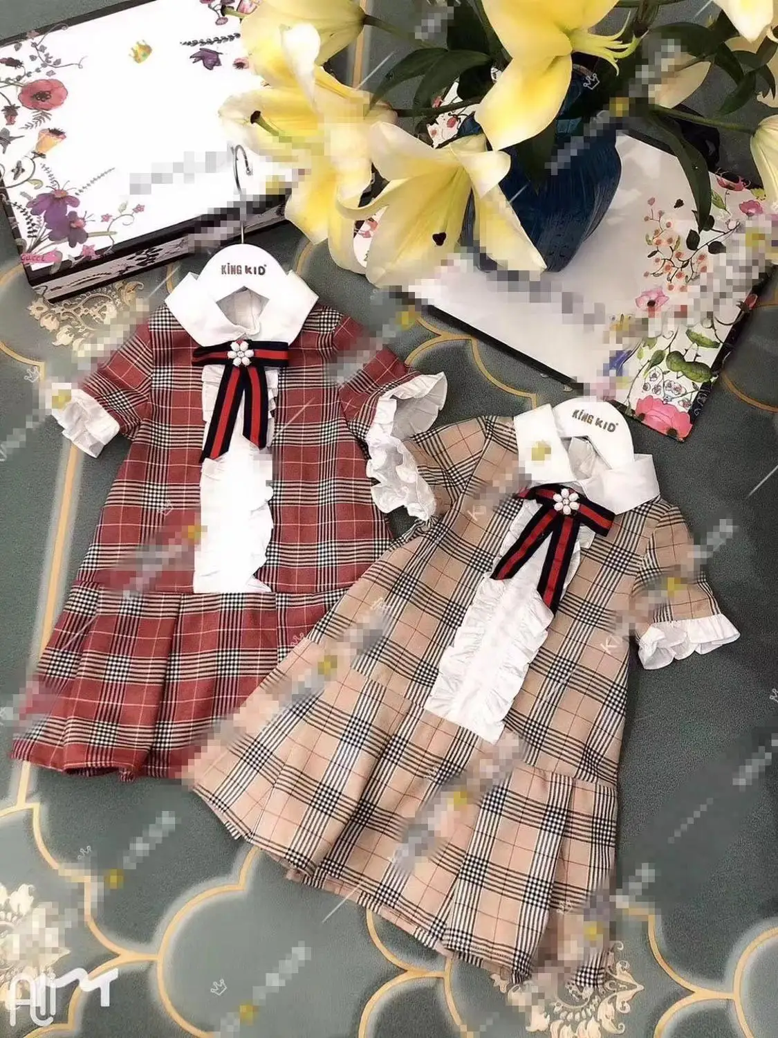 

Roimyal Wholesale 2019 Summer 3-8 Years Girl Plaid Short Sleeve Dress Fashion Neckline Bow Decoration College Wind Dress