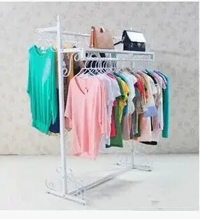 

Clothing store iron art display rack. Single bar landing... The nakashima family hangers..