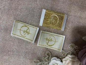 

Metallic Gold thread Customized woven label / garment tags / main label Damask Satin clothing label End fold Center Fold label