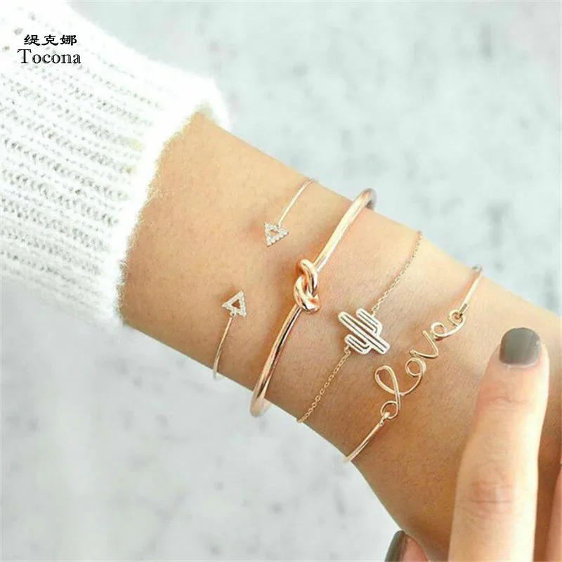 

Tocona 4PCS/Set Letter Cactus Knot Triangle Charm Cuff Bracelets Set for Women Gold Alloy Chain Bracelet Boho Jewelry 6116