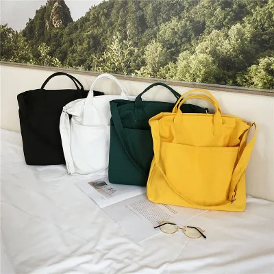 

Solid color canvas handbag simple fan version small fresh literary temperament cloth bag casual wild shoulder bag green shopping