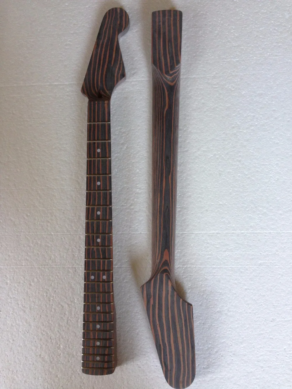 

Free shipping zebra wood guitar Neck one piece wood neck no painting guitar shape can choose