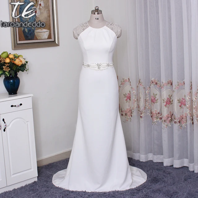 Cap Sleeved Crepe Sheath Wedding Dress Jp341608 Highly Embellished Cap Sleeved Crepe Sheath Wedding Dress Jp341608 Highly Embellished Sleeves Back Keyhole And Waistband Bridal