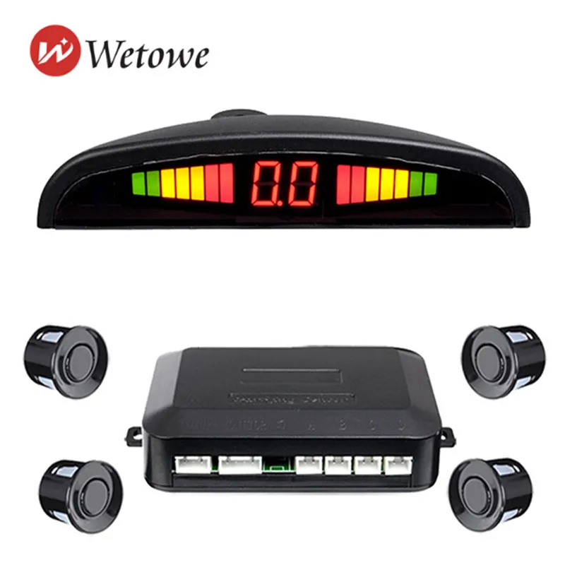 

Small crescent 4 sensor buzzer car universal reversing radar Reversing reminders, and avoiding collisions.Digital band display