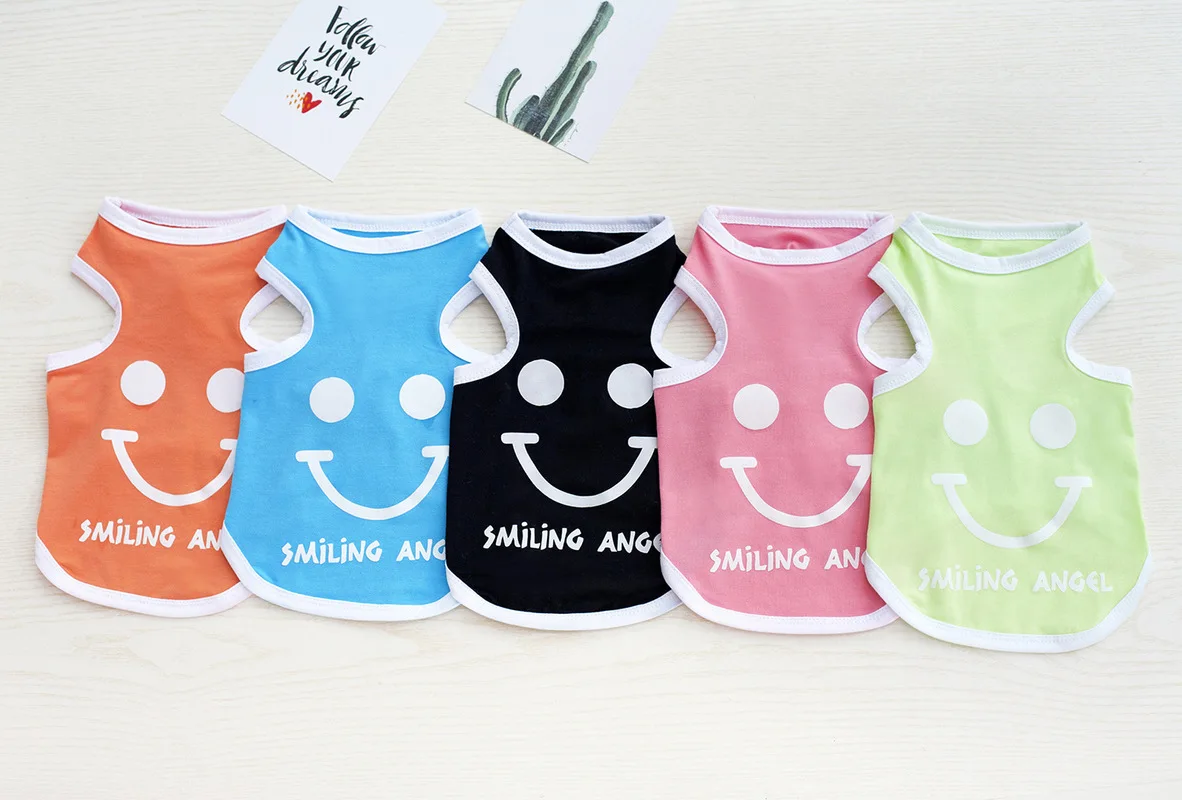 

Dogbaby pet clothes, dog clothes, smile vests.