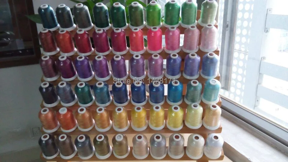 

Free shipping high quality 61 Brother colors machine polyester embroidery thread+1000m/mini-king spool + 15pcs A plastic bobbin
