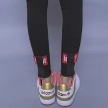 Fashion street HARAJUKU classic all match high waist behind applique letter ribbon female elastic legging